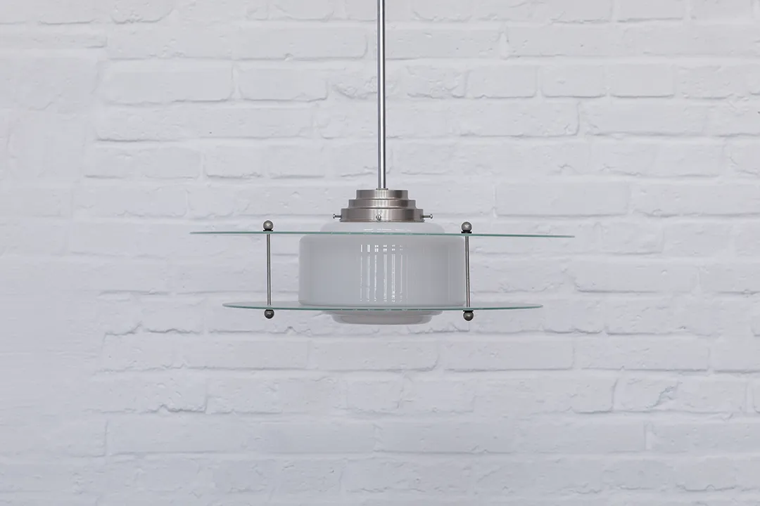 Pendant lamp in the style of Gispen models. Tiered satin glass body with two horizontal glass discs. Bauhaus-inspired design from the 1930s. From the collection of Prof. Dr. Klaus Struve.