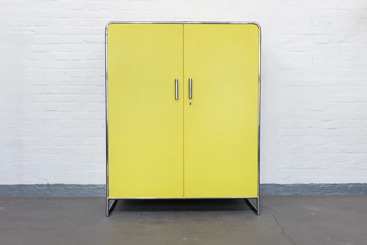 Rare 1930s Bauhaus wardrobe by John Hagemann for Thonet-Mundus with chrome-plated tubular steel and newly lacquered yellow wood panels.