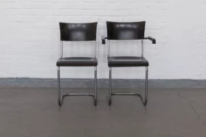 Two original Cantilever Chairs B43 and B43F by Mart Stam for Thonet-Mundus, early 1930s — black lacquered beechwood, chrome tubular steel, Bauhaus Modernism.
