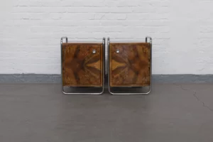 Pair of Bauhaus nightstands made of walnut burl veneer and tubular steel, Czechoslovakia, circa 1930.
