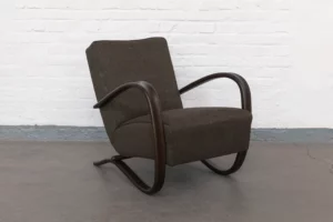 Streamline armchair H269 by Jindřich Halabala, made in 1930s Brno, bentwood armrests and traditional horsehair upholstery. Restored with great attention to detail and upholstered in a subtly melanged brown fabric, this design reflects the elegance and innovation of Czechoslovak modernism.